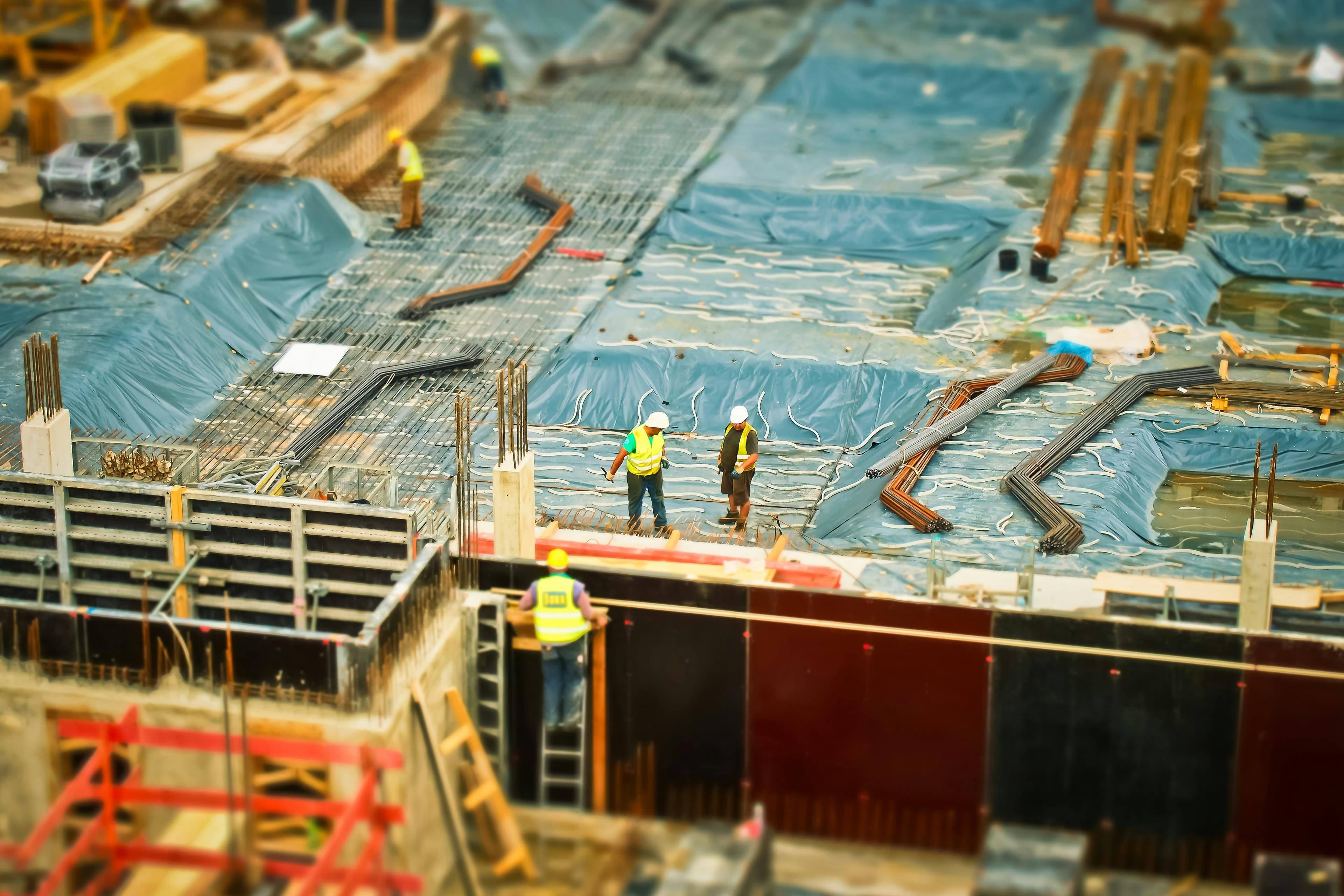 Construction site overview with active work fronts